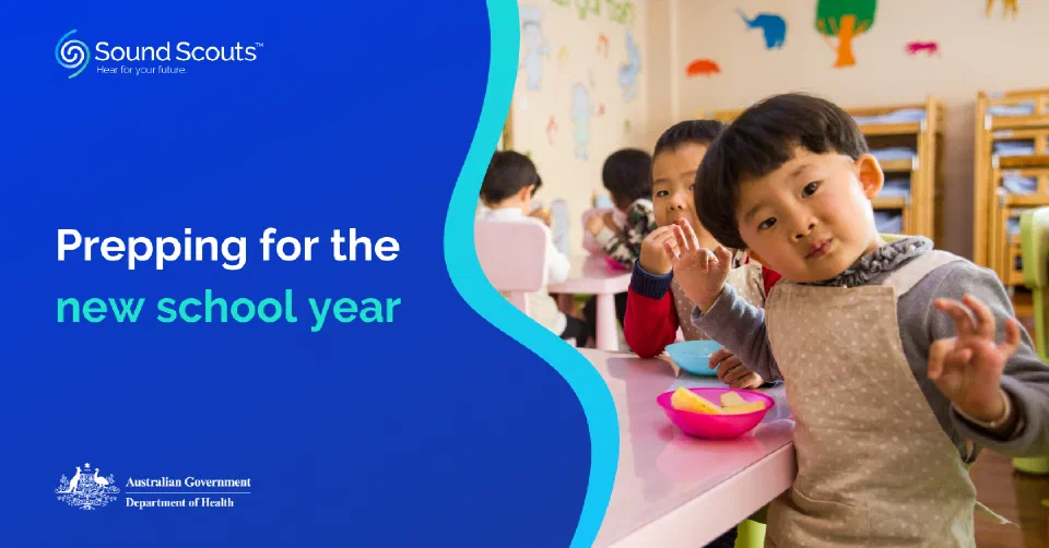 Sound Scouts graphic with title Preppig for the new school year, with image of child wearing an apron sitting at a lunch table looking at the camera.